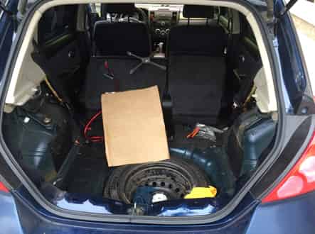 Открыть багажник Nissan Tiida