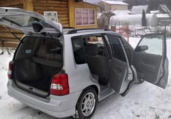 Открыть дверь Mazda